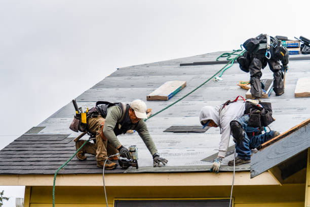 Professional Gutter Installation technician working in Swan, IA